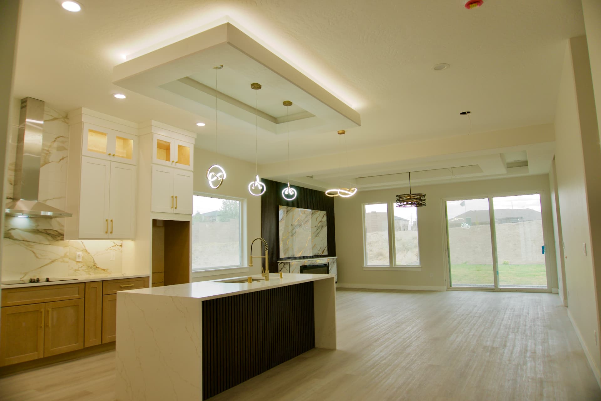 Open-concept kitchen and living area in a new Tri-Cities home